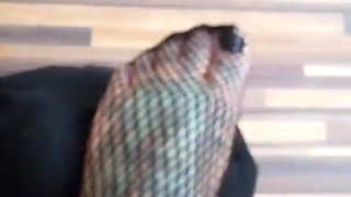 Blonde tattooed lady and her foot slave