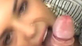 Hot brunette sucks a truck driver's cock in a parking lot making him cum