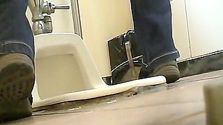 Pissing in the toilet and showing bushy pussy on
