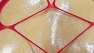 Nipple Play in Red Bodystocking