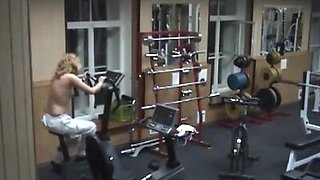 Charming doll exercising naked in the gym!