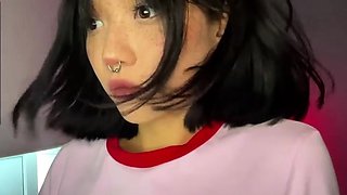 Asian babe sucking and jerking two hard dicks