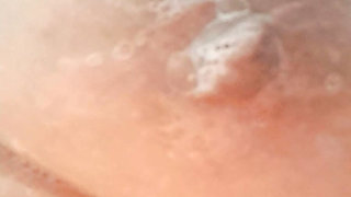 53 year old milf, tits and pussy covered in cream, wet in the shower