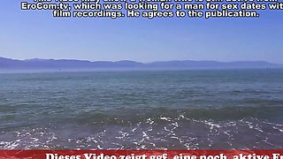 Fucking a teen outside on the public beach