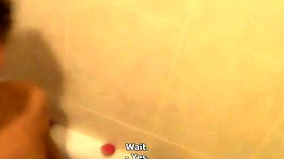 MILF having fun in public bathroom
