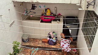 The Neighbor Is Watched Washing Clothes by Her Neighbor