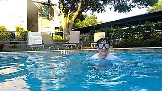 Couple Underwater Diving and Swimming
