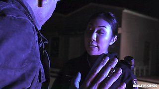 Officer Nicole Doshi is sucking Mick Blue's cock outdoors