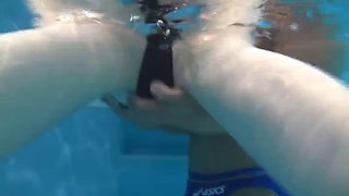Horny Japanese swimmer gets ravished by the pool with her costume on