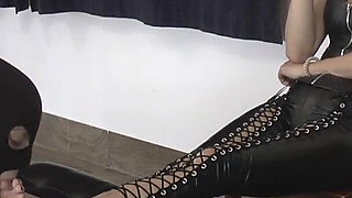 Mistress Tatjana Dominates Two Slaves