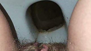 Big Load of Pee From Hairy Pussy