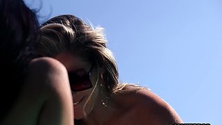 Two lusty lesbians making out outdoor