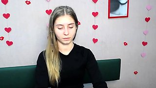 Young Ukrainian blonde in red panties posing on webcam show