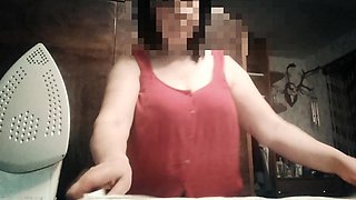 Stepmom, 57 Years Old, with Big Natural Tits, Irons Clothes and Has a Secret Video Call with Her Stepson