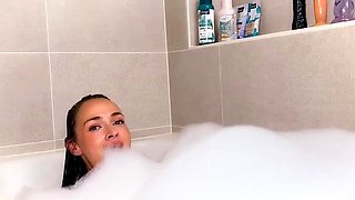 Teen Sexy Lexxy having dildo sex in the bathtub