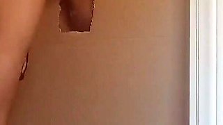 In a Nylon Catsuit and High Heels I Suck a Cock and Fuck It in a Gloryhole Until It Cums in My Mouth