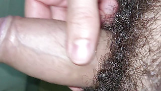 Hairy cumming madly in the bathroom