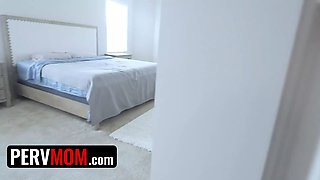 Hot big boobed milf Nina Elle sucks her stepson's shaft while on the smartphone