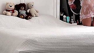 Stepmom Tidies the Bedroom. in Her Sheer White Robe