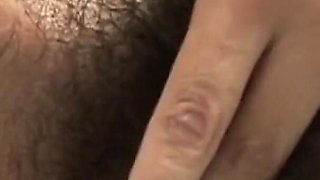 Mora gets excited while taking a hot bath and satisfies her hairy pussy by masturbating it