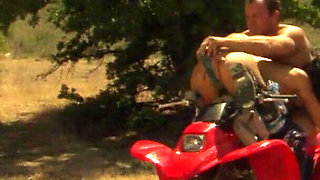 Kinky pornstars fuck on their four-wheeler outdoors
