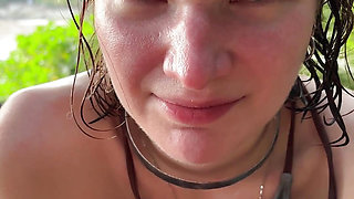 Horny teen in bikini gives oily titjob and suck my dick on public beach