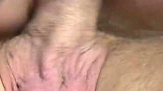 Bondage sex man in bed with two dominatrix woman