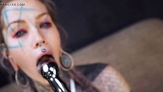 Anuskatzz grabs her cold, stainless steel toy and slides it deep into her tight ass