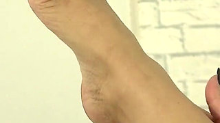 Slut MILF Gives Hot Footjob!