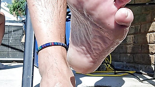 Showing off my wet feet and hairy legs