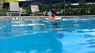 Couple Underwater Diving and Swimming