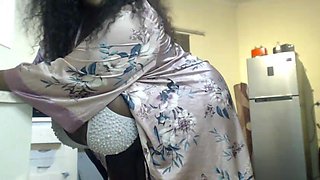 African Stepmum Stripteasing and Masturbating at Then Kitchen