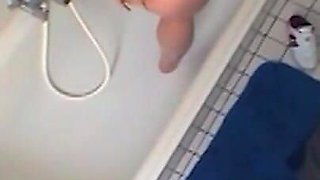 Sexy chubby amateur fucks herself in the bathroom