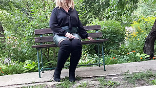 Mature milf in sexy clothes helps a man pee outdoors