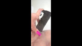 MILF Plays in the Tub with a Big Dildo