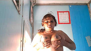 Tina Nandy and Tejaswini Prabhakar whispering in the dark