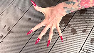 Long Red Nails and Long Fingers in Swimming Pool