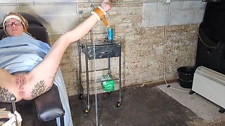 Restrained in Gyno Chair with Anal Insertion & Metal Toy
