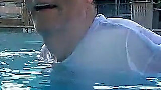 Couple Underwater Diving and Swimming