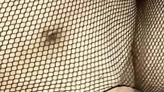 Wildenglishbbw laying in bed in fishnet body suite