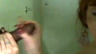 Redhead Amateur MILF Sucks BBC at Gloryhole