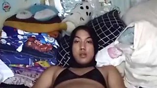 Sexy hijab femboy wearing bikini and playing cock on the bed