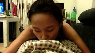 Naughty Asian teen flaunts her perky tits and fucks a cock