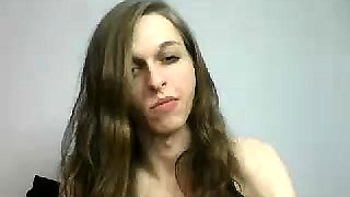 Cute brunette tranny in stockings jerks off on the webcam