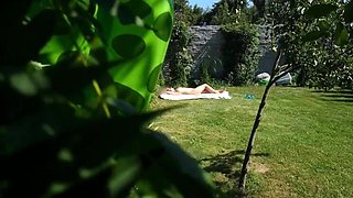 Sexy Blonde Stepmom sunbathing Naked in the Yard