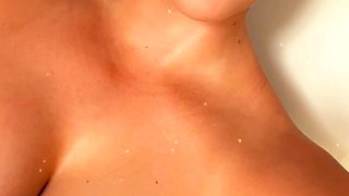 Glamour babe with big boobs masturbates in lingerie