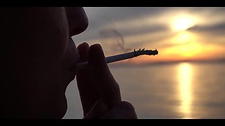 Smoking Cigarettes on the Beach... at Day and in Sunset.