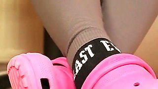 Under Desk Foot Play - Pink Clogs & Worn Socks