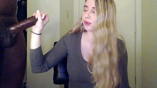 Amateur wife gives an interracial cuckold handjob