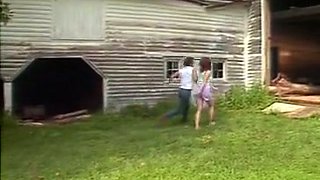 Curvy and busty redhead lady gets naughty in the barn